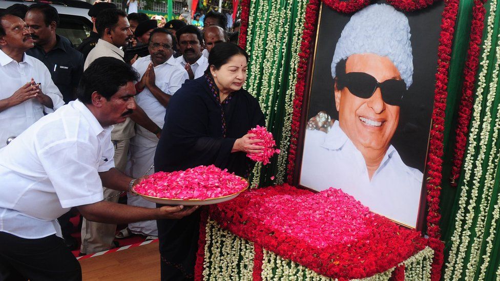 Jayalalitha visits a portrait of party founder MG Ramachandran in Chennai on 20 May