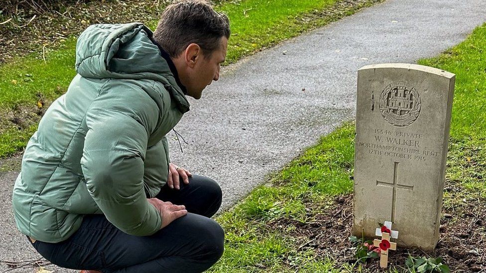 Phil Dowson caring for a war grave