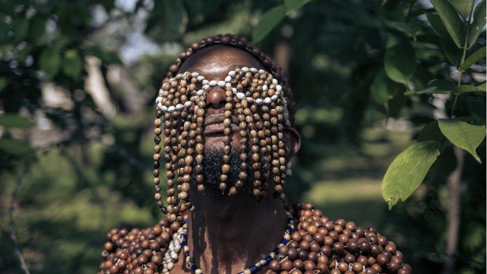 A performer poses for a photograph during a gathering of sapeurs in Kinshasa, capital of the Democratic Republic of Congo, on February 10, 2023.