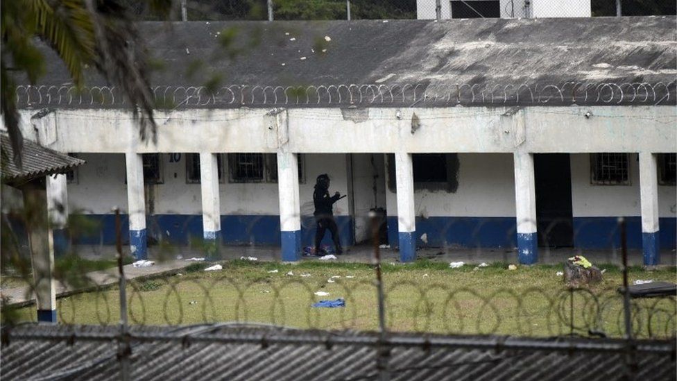 A police officer inside the Male Juvenile Detention Centre before the operation to rescue four hostages held by inmates on March 20, 2017.