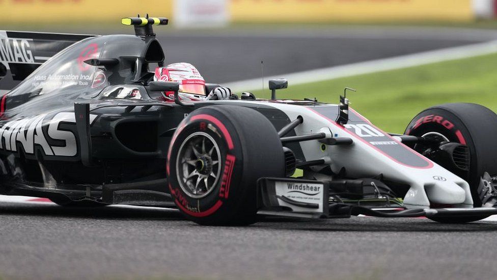 Haas F1's Danish driver Kevin Magnussen drives during the qualifying session of the Formula One Japanese Grand Prix at Suzuka on October 7, 2017