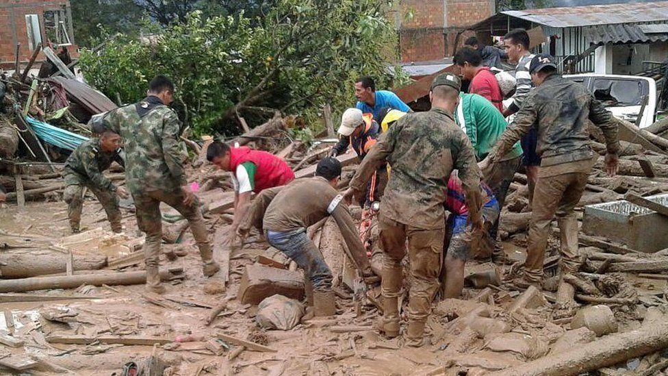Soldiers have had to dig people out from the mud and debris