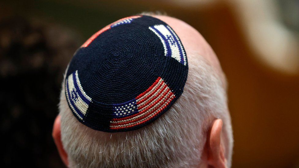 An attendee wears a kippah decorated with Israel's and US flags during a solidarity vigil for Israel held at the Stephen Wise Temple in Los Angeles, California, USA, 08 October 2023