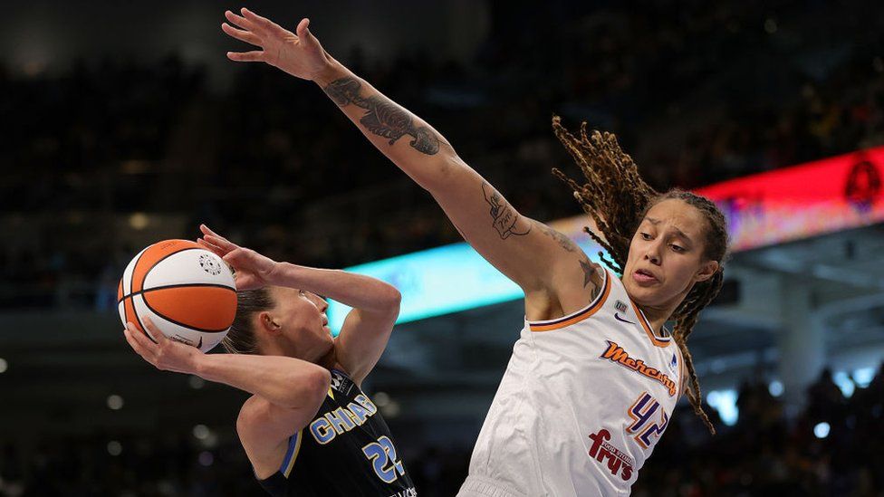 Brittney Griner blocks a shot in an WNBA game
