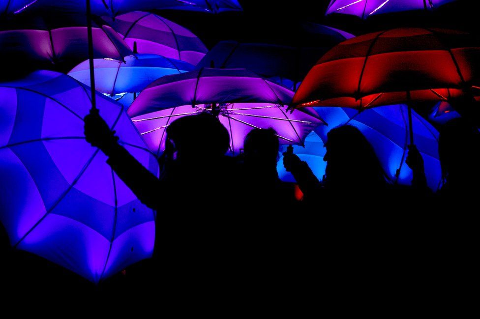 Multicoloured umbrellas at a festival