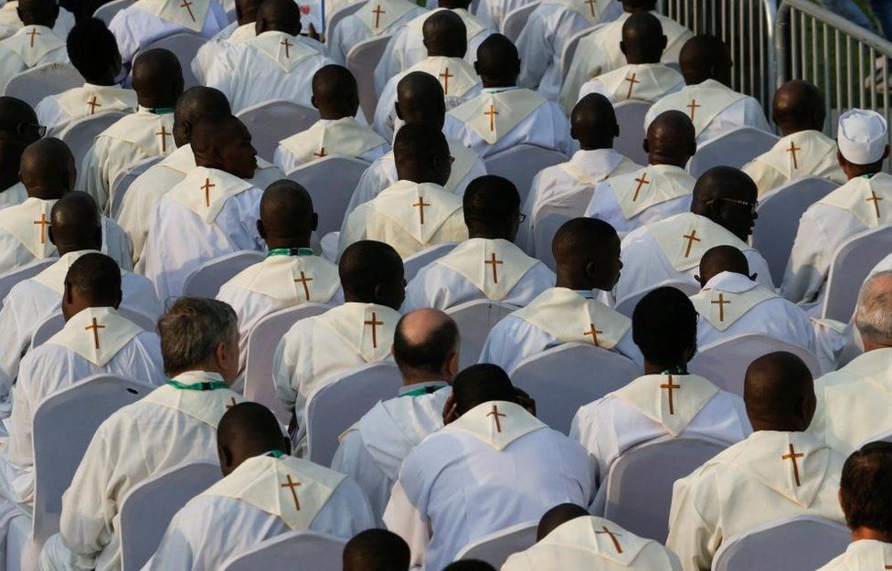 Clergy dresses in white