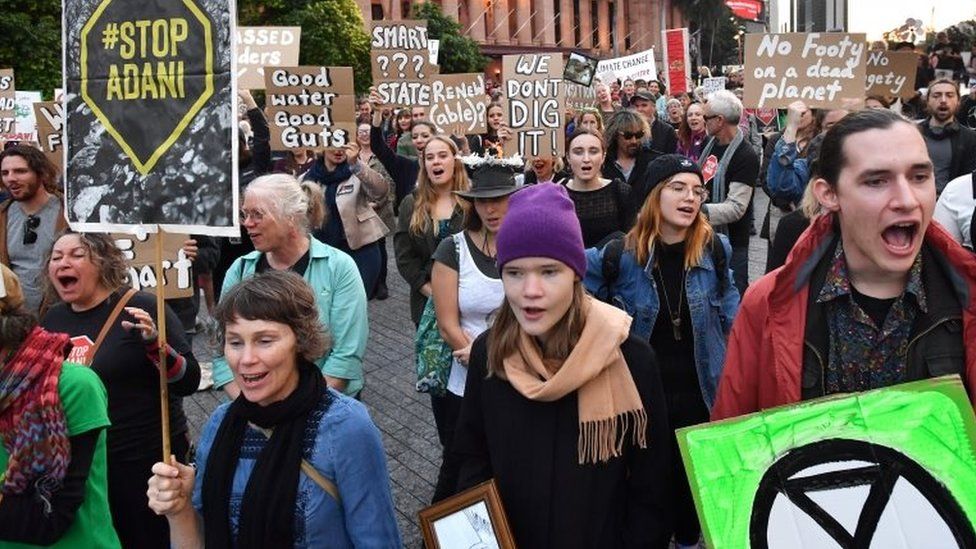 People protest against the Adani mine in Australia