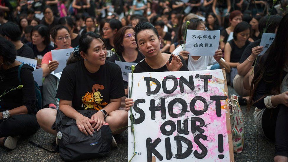 A group of Hong Kong mothers attend a rally in Hong Kong, China, 14 June 2019
