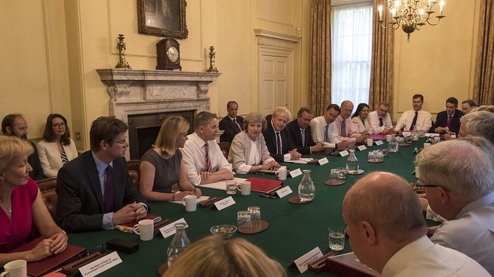 Theresa May chairing her first Cabinet meeting in July