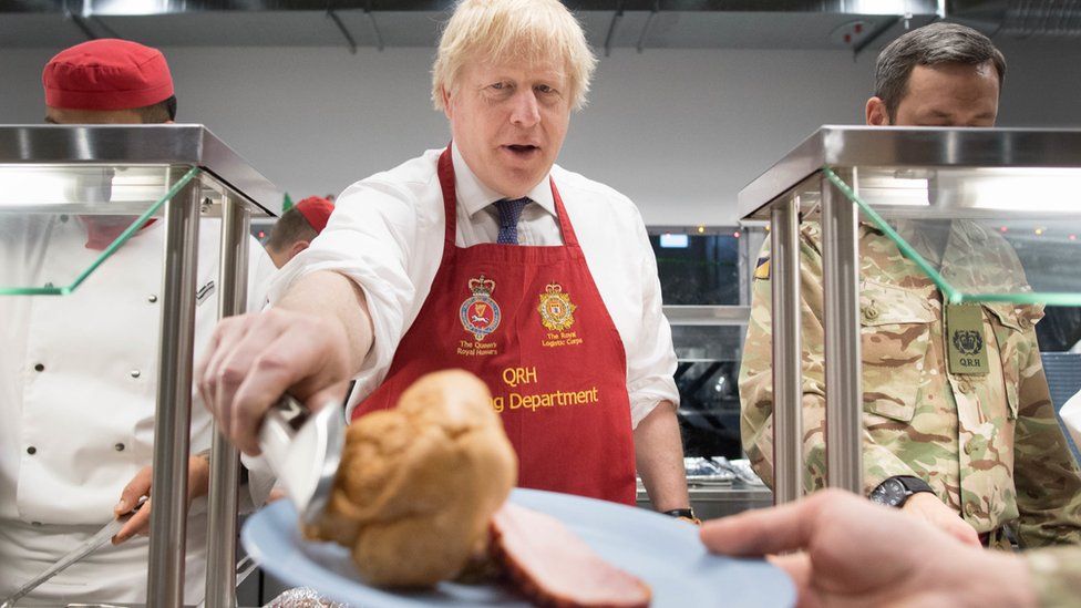 The PM served turkey and Yorkshire puddings in the base's canteen
