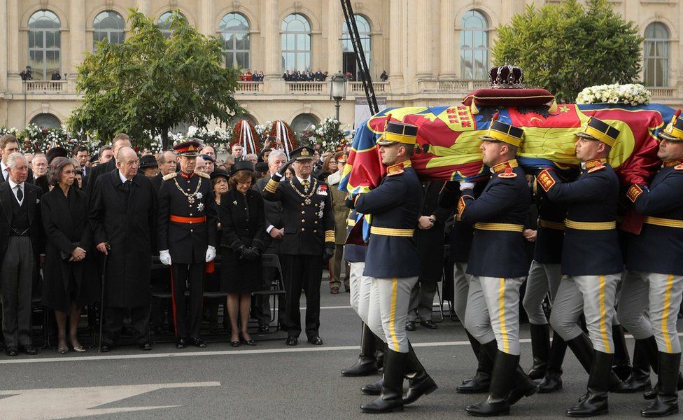Soldiers carry the coffin of the late King Michael during a funeral ceremony in Bucharest, Romania, 16 December