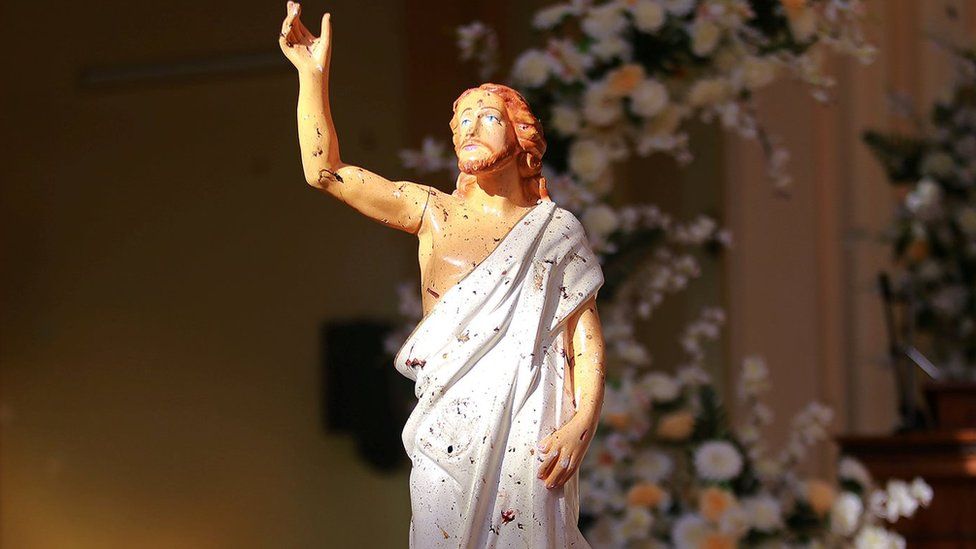 Blood-splattered Jesus statue in a church in Negombo