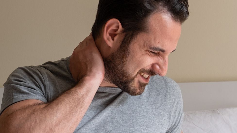 Stock image of a man in pain