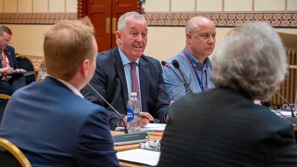 A meeting around a table at Northampton Guildhall