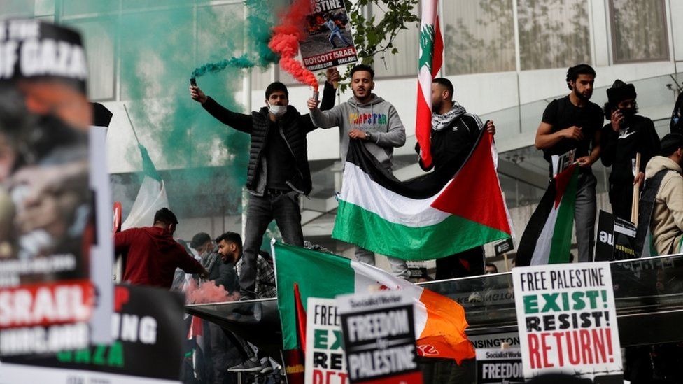 Demonstrators march in London to support of Palestinians amid ongoing violence with Israel