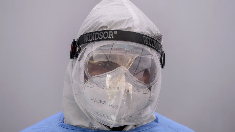 A man wearing PPE kits