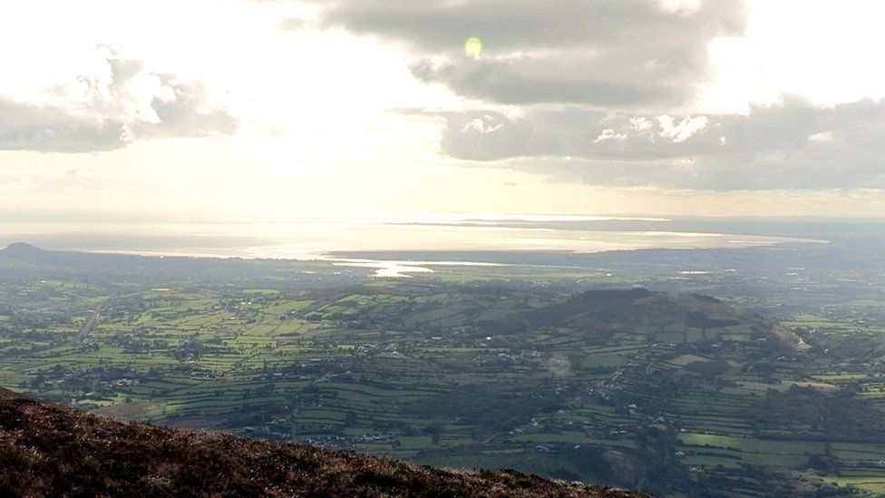 The view of the surrounding countryside and Carlingford Lough from the top of Slieve Gullion
