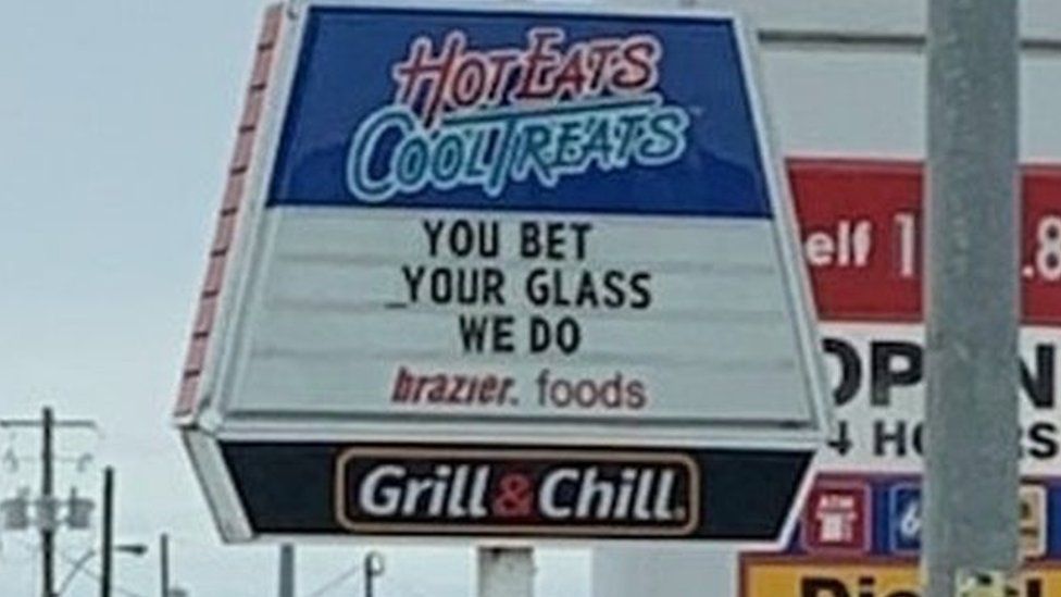 A sign reads 'You bet your glass we do'