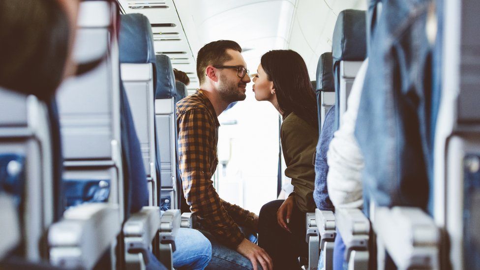 Couple on plane