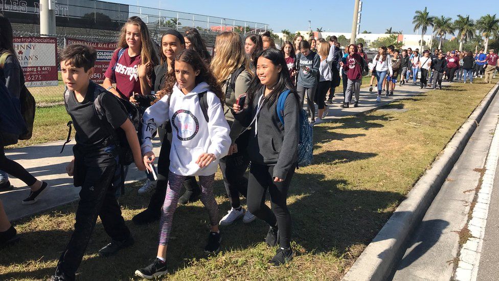 Students walkout at Marjory Stoneman Douglas High School during National School Walkout to protest gun violence in Parkland, Florida, U.S., March 14, 2018
