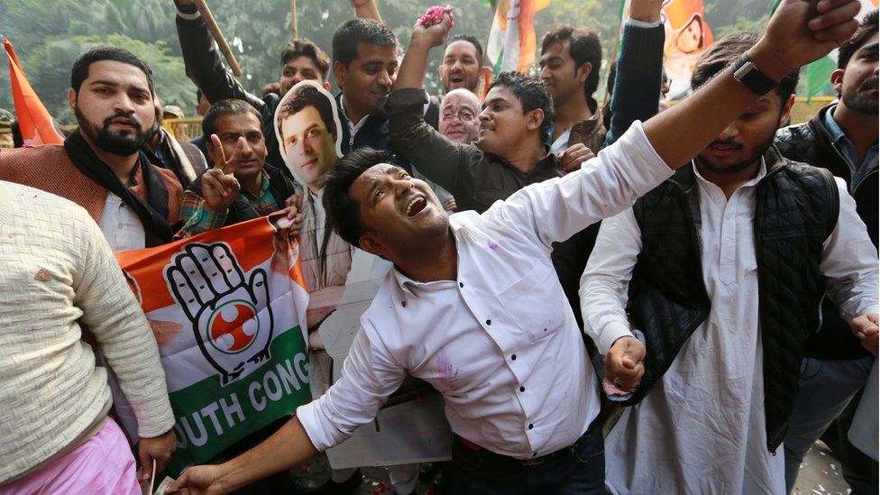 Supporters of India's main opposition Congress party celebrate after the initial poll results at the party headquarters in New Delhi, India, December 11, 2018