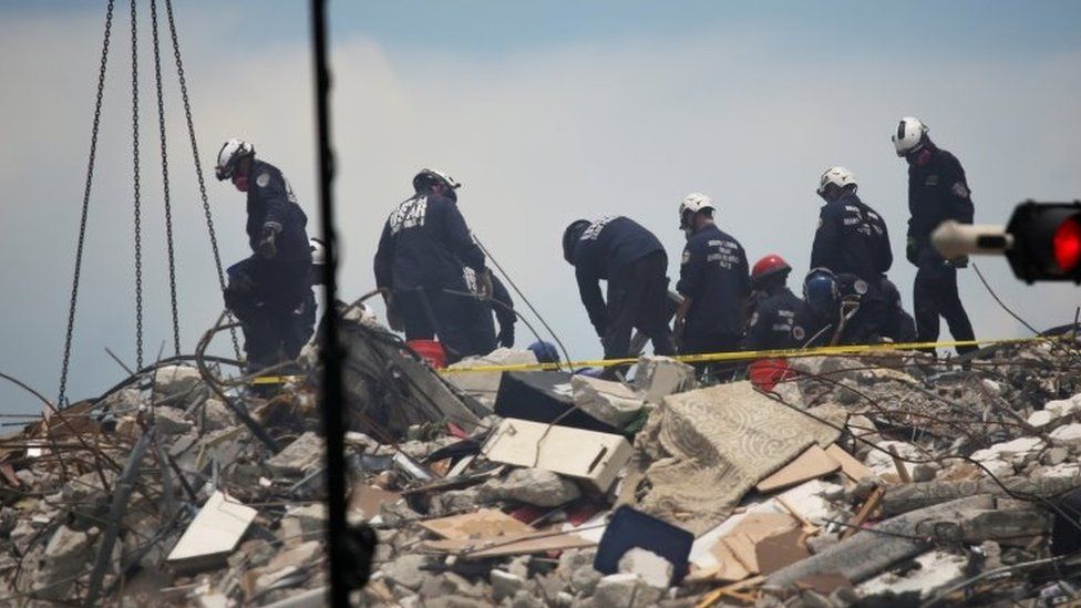 Rescuers seen in Florida rubble