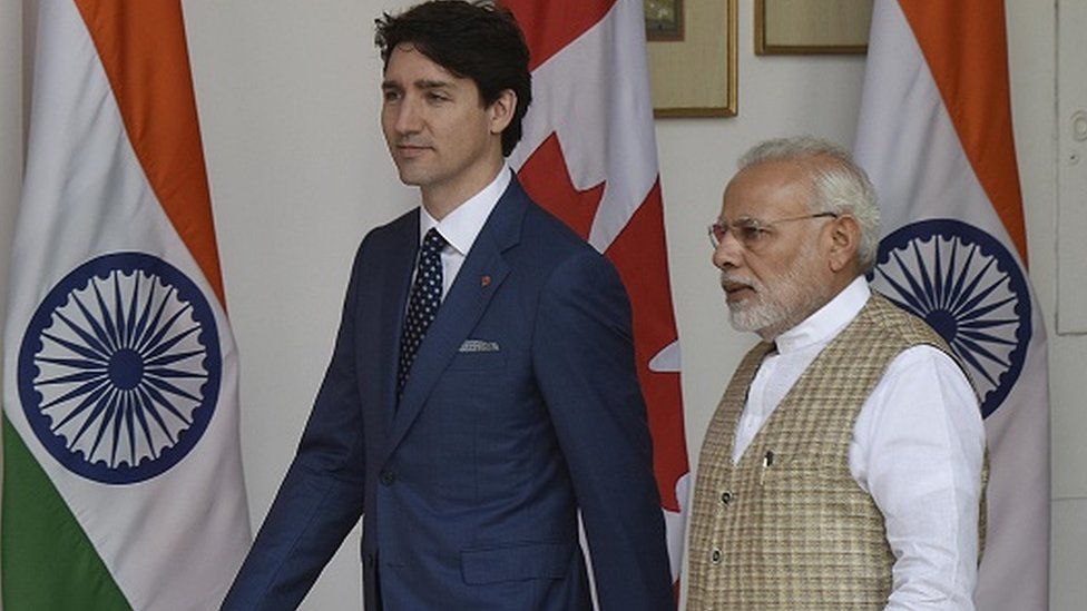 Canadian Prime Minister Justin Trudeau walks with PM Narendra Modi before a meeting at Hyderabad House on February 23, 2018 in New Delhi, India