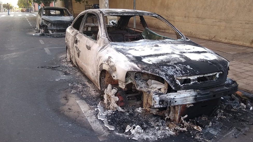 Cars burnt during a bank robbery are seen in Aracatuba, a city some 520 km from Sao Paulo, Brazil, on August 30, 2021