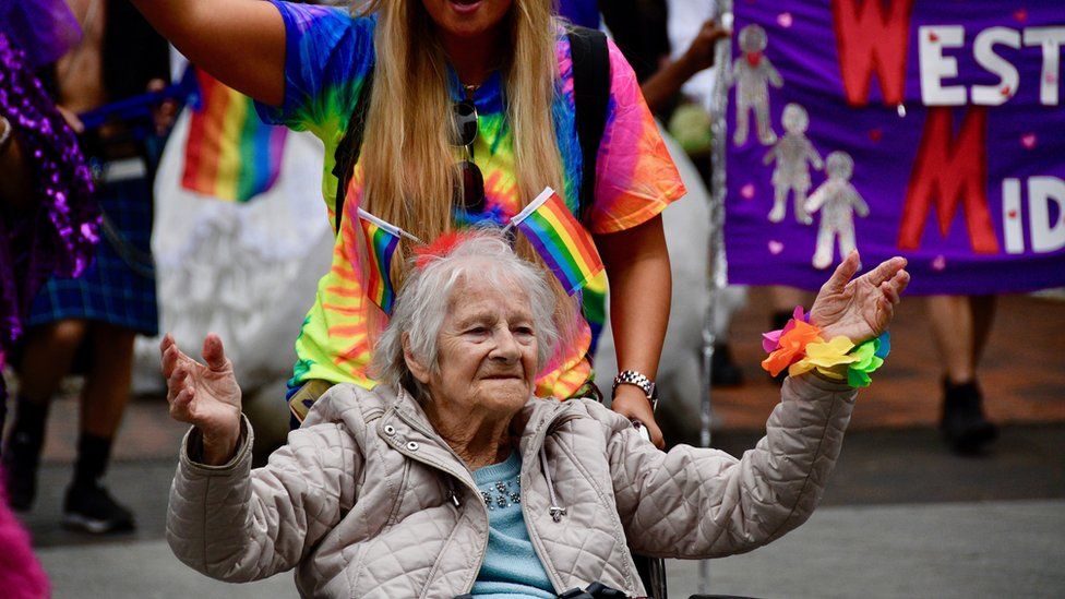 Pensioner taking part in Pride