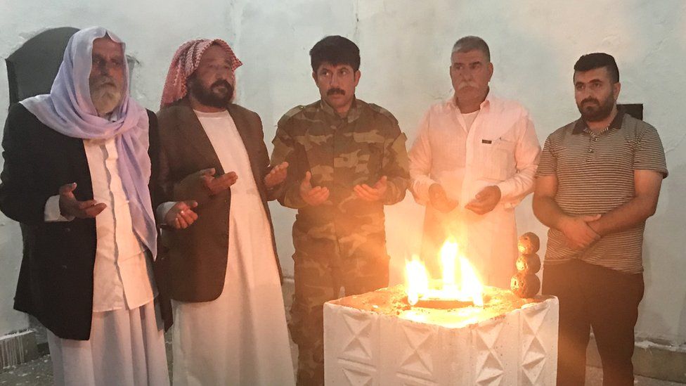 Yazidis worship at a temple
