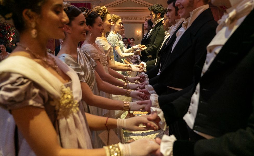 A picture of attendees at a ball in Bridgerton