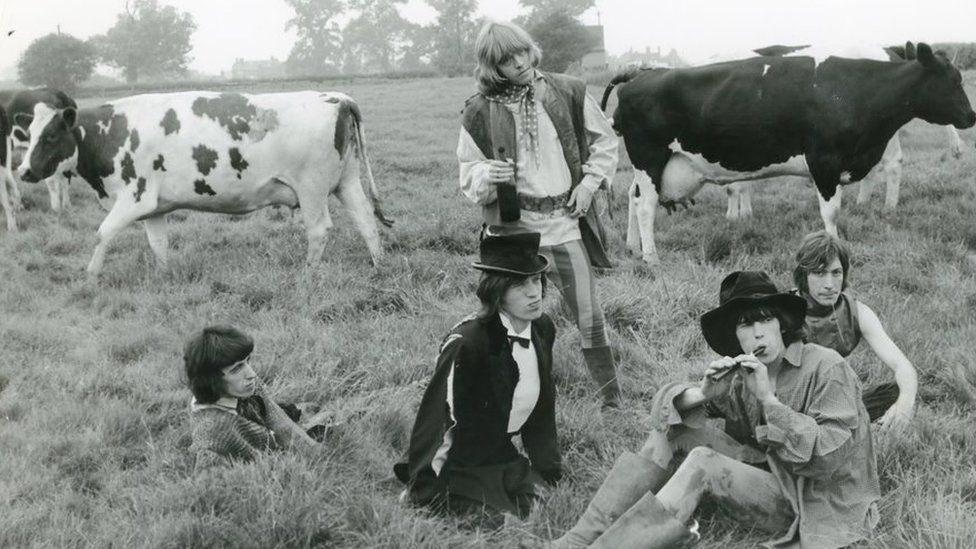The Stones dressed up and sat amongst the cows for their 'Beggars Banquet' album cover shoot in 1968