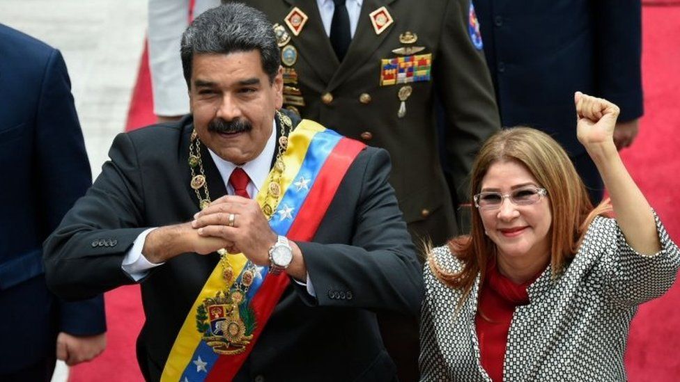 Venezuelan President Nicolas Maduro and his wife Cilia Flores arrive at the Congress for the inauguration ceremony in Caracas.