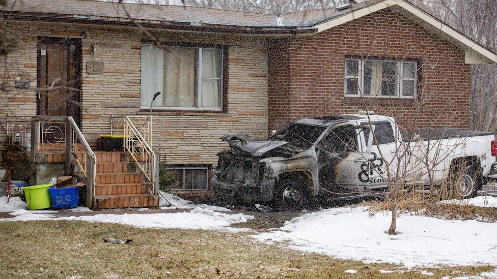 Burned-out truck outside a home in Aurora, Ontario