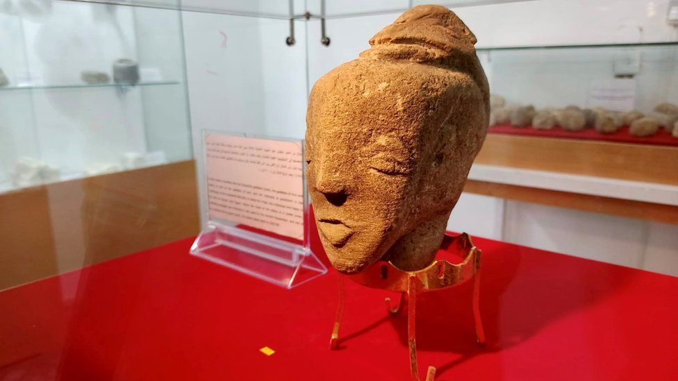 The limestone head of a 4,500-year-old stone sculpture said to depict the Canaanite goddess Anat, which was found by a farmer in the Gaza Strip