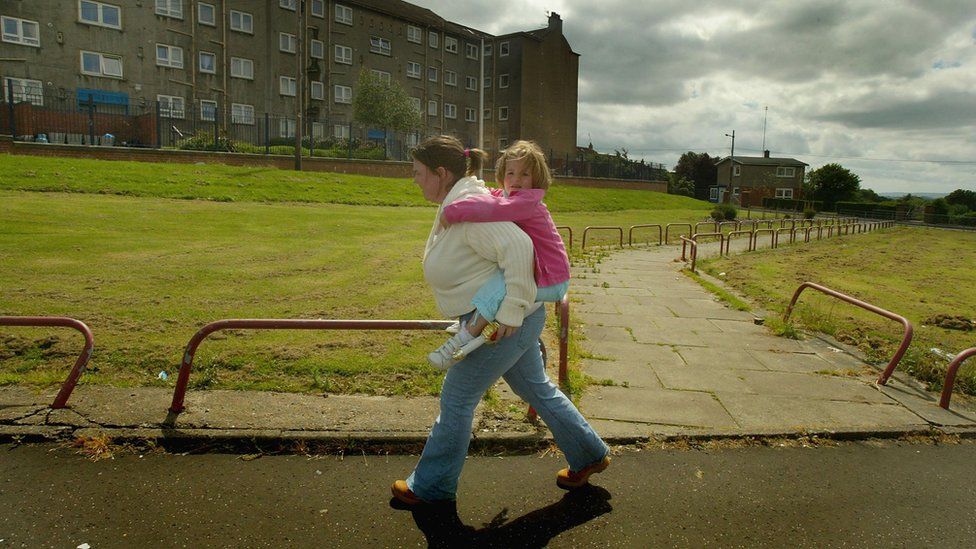 Mother and daughter on a Glasgow housing estate