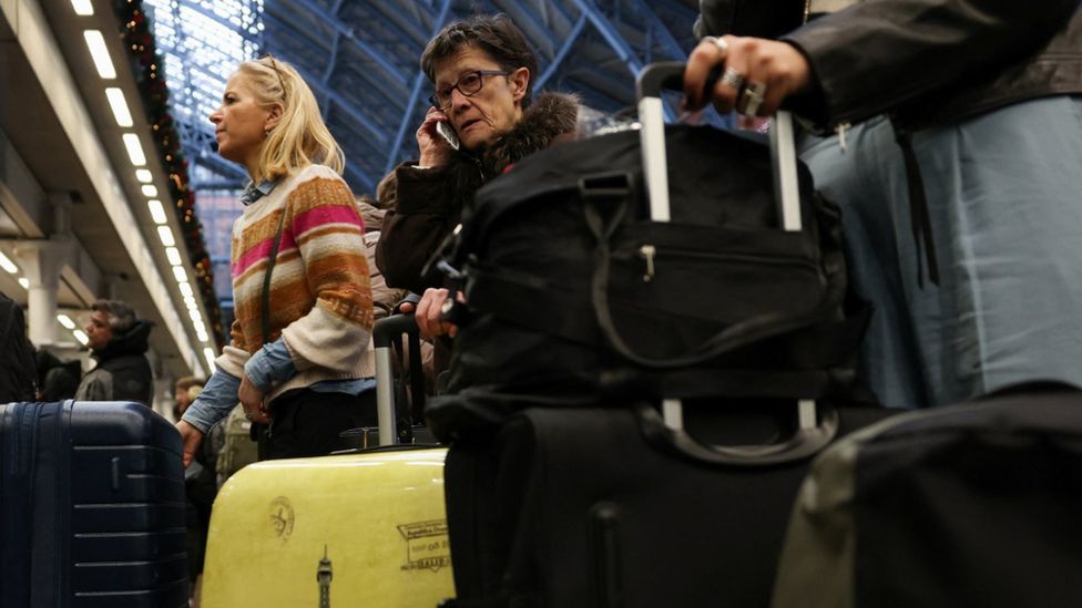Passengers wait at St Pancras International as an unexpected strike by French workers at Eurotunnel interrupted cross-Channel rail traffic on Thursday