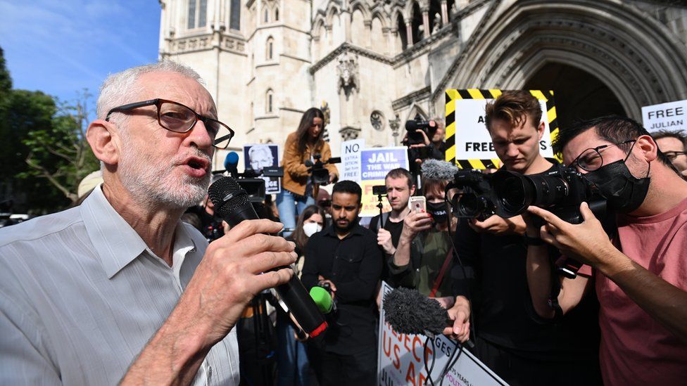 Jeremy Corbyn speaks to the media outside the Royal Courts of Justice