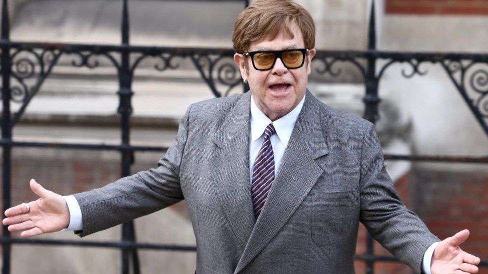 Sir Elton John leaves the High Court in London