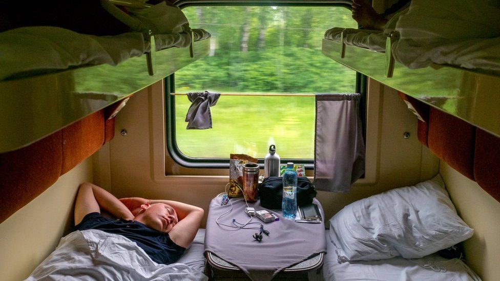 Passengers in their beds in a second class cabin