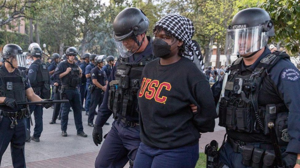 Members of the law enforcement and police officers intervene the Pro-Palestinian student protesters as they gather to protest Israel attacks over Gaza, at University of Southern California in Los Angeles, California, United States on April 24, 2024.