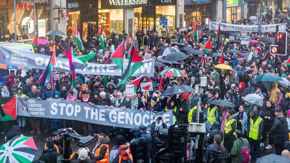 People take part in a march and demonstration in Glasgow demanding a ceasefire in the Israel-Hamas conflict
