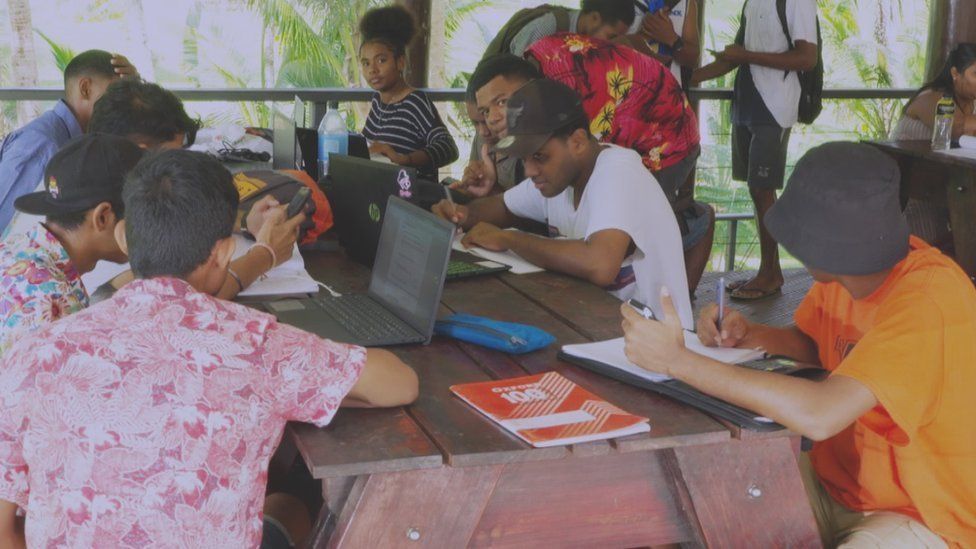 Students in Fiji studying together