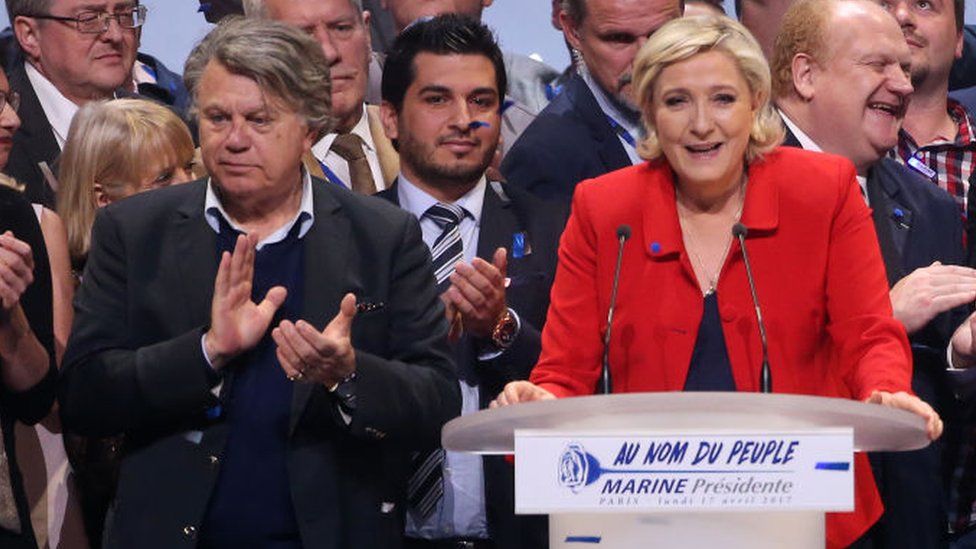 Gilbert Collard (L) and Marine Le Pen at a 2017 rally