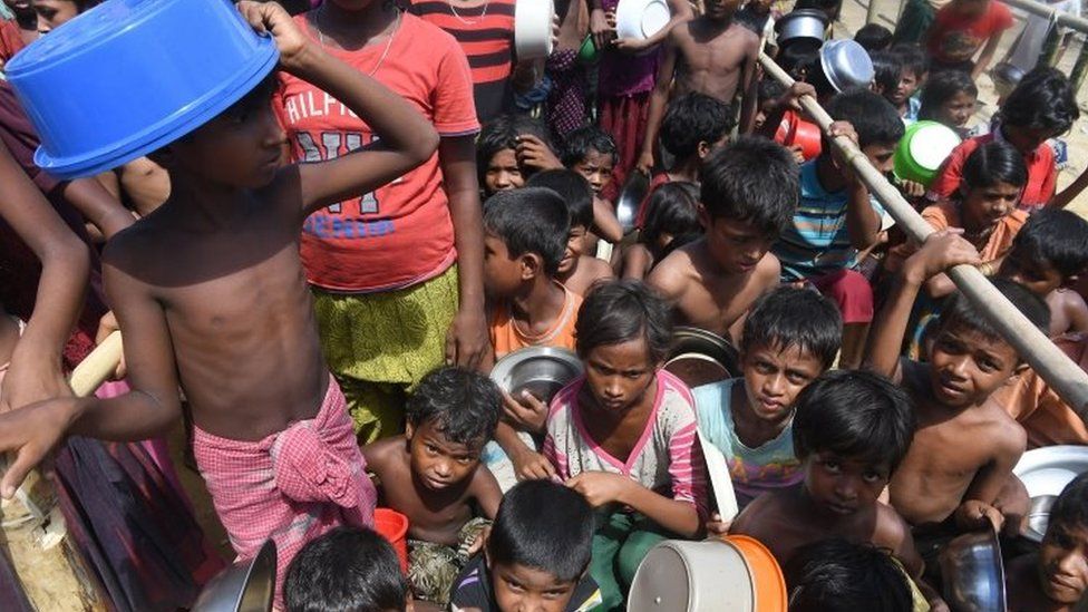 Rohingya refugee children gathering for food distribution at the Palangkhali refugee camp in the Ukhia district of Bangladesh (10 October 2017)