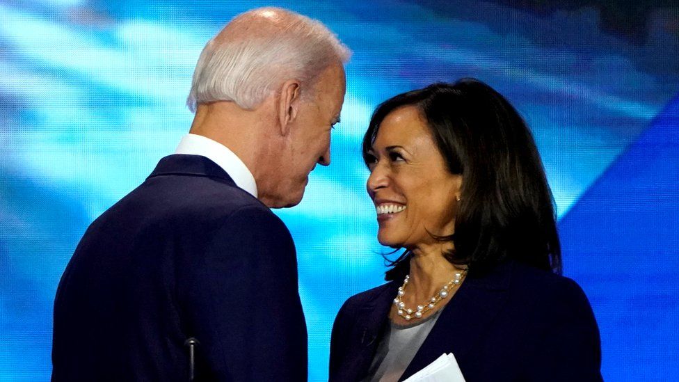 Former Vice-President Joe Biden talks with Senator Harris after the conclusion of the 2020 Democratic US presidential debate in Houston, Texas, 12 September 2019