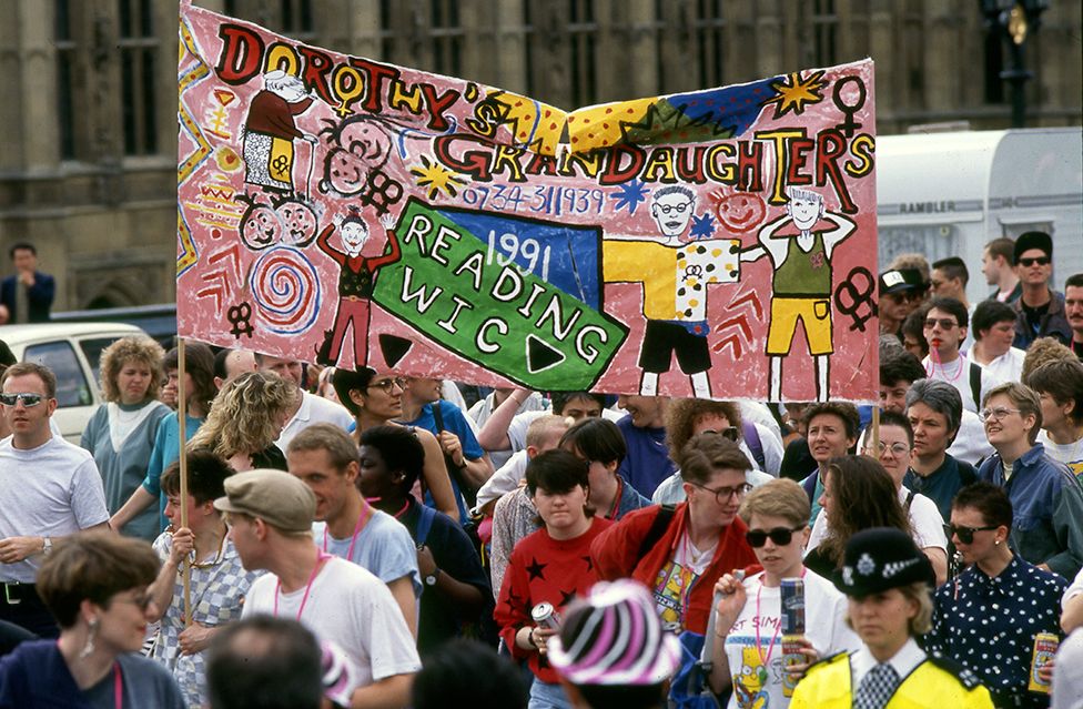 People attend the Pride march in 1991