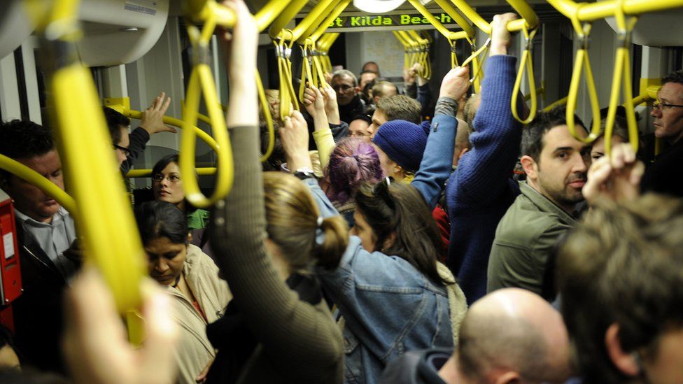 Inside of a packed tram in Melbourne