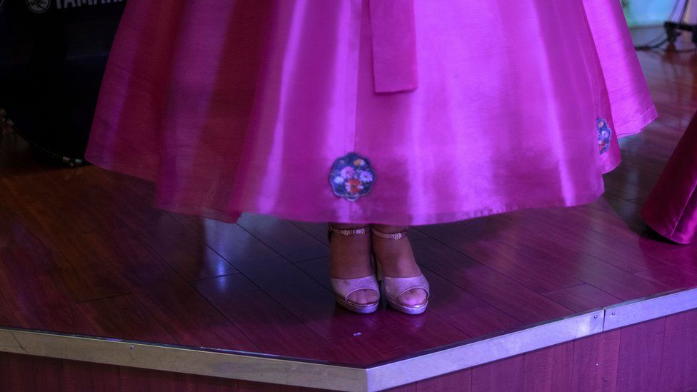 A picture shows the shoes of a North Korean singer, in a restaurant of the Chinese border town of Dandong, in China's northeast Liaoning province, on May 30, 2018.