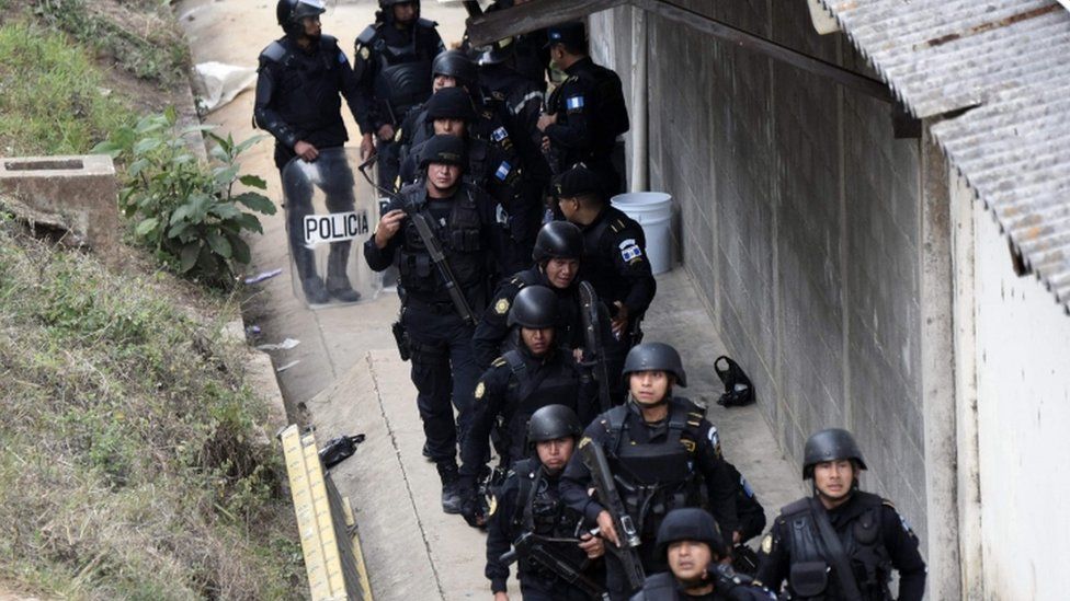 Riot police agents are pictured after the operation to rescue the four hostages kept held by inmates at the Stage II Male Juvenile Detention Center in San Jose Pinula, east of Guatemala City, 20 March 2017